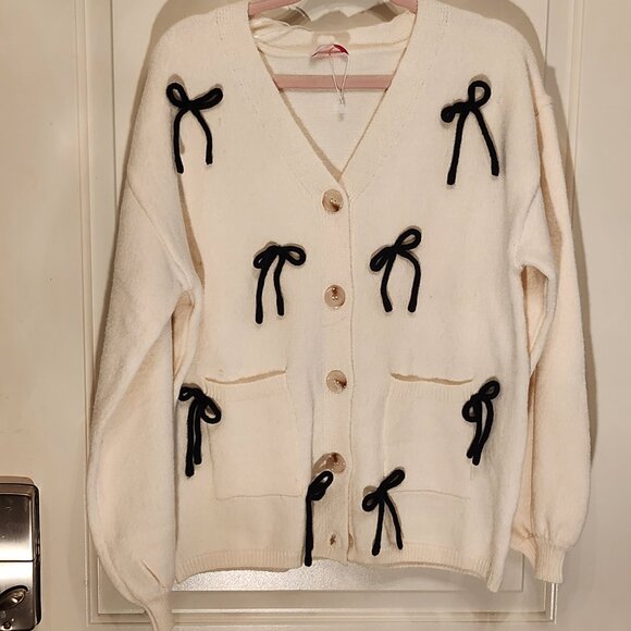 By Anthropologie Sweaters - Anthropology Button Down Bow Cardigan.